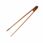 Bild einer Holz-Grillzange