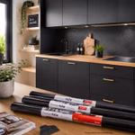 Bild einer Box voll Klebefolien schwarz Bild einer Box voll Klebefolien schwarz